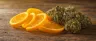Agent Orange strain cannabis buds with orange peel