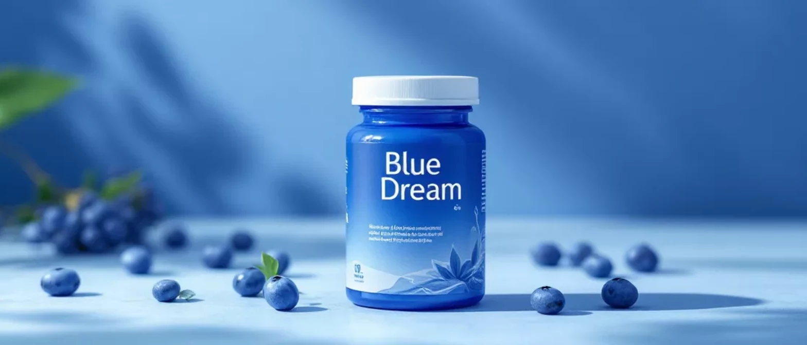 Blue Dream supplement bottle surrounded by blueberries