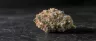 Mac 1 cannabis strain dense frosty buds close-up