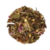 Herbal mixture with colorful dried flowers and a transparent capsule in the center.