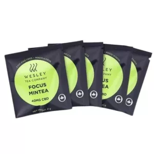Five tea packets with green labels, featuring focus mintea and cbd information.