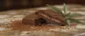 Assorted cannabis chocolate squares on dark background