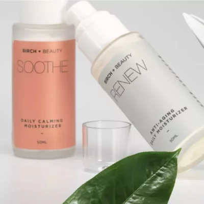 Birch + Beauty Soothe & Renew moisturizers, 50ML each, with natural leaf accent.