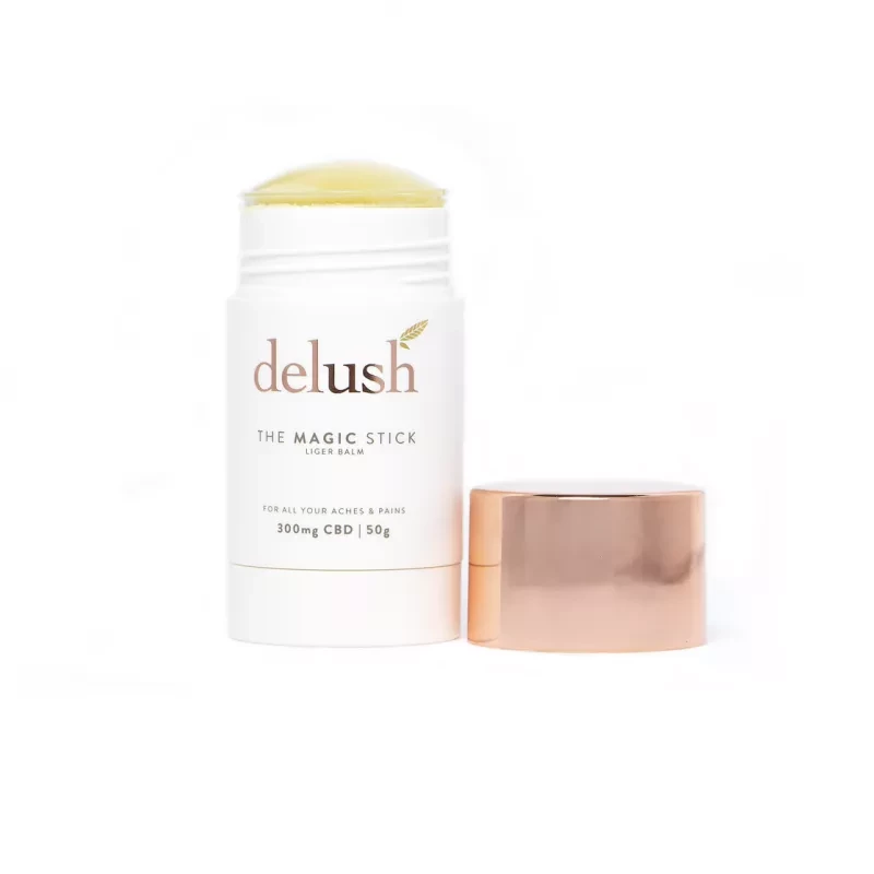 Delush Magic Stick - 300mg CBD balm for pain relief with golden leaf design.