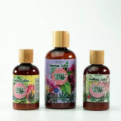 Organic Sweet Jane lotion trio with healing, synergy, and soothing properties, wooden caps, botanical labels.