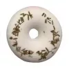 Handcrafted white donut soap with herbal sprinkles.
