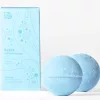Light blue CBD bath bombs 2-pack with Ylang-Ylang, Lavender, and English Rose aromatics.