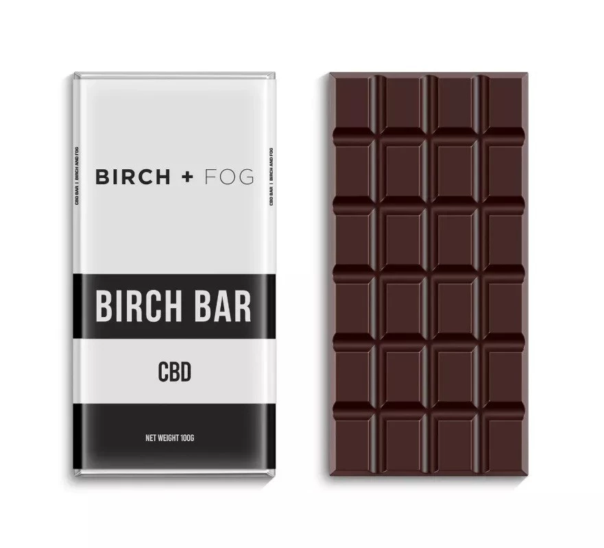 CBD-infused chocolate bar packaging and chocolate pieces