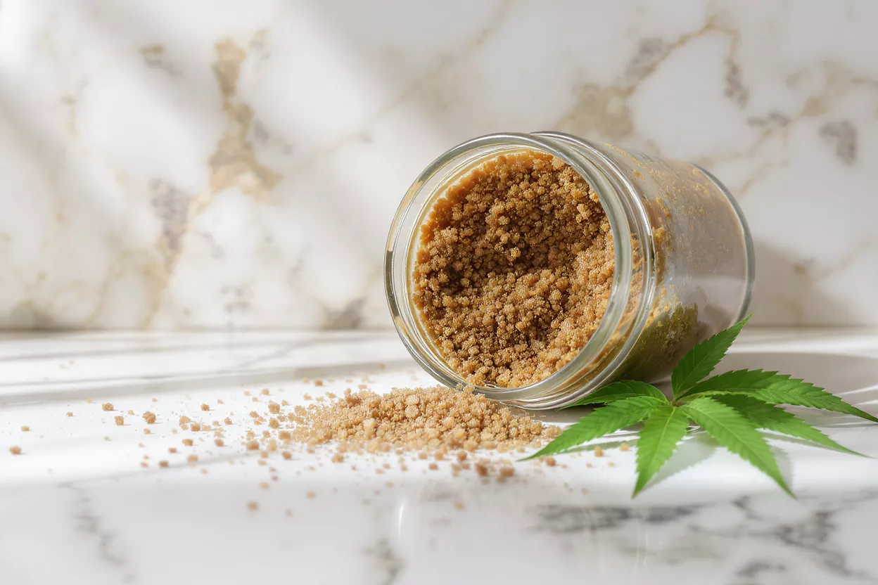 Jar of cannabis sugar with spilled contents