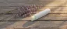 CBD stick for pain relief on sore muscle area