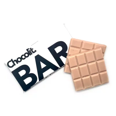 Chocolit Strawberry THC-infused bar in sleek packaging, half unwrapped to reveal milk chocolate squares.
