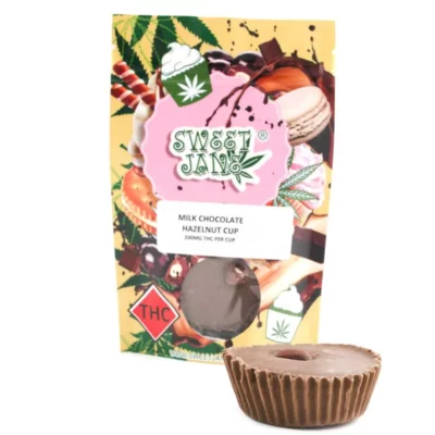 Sweet Jane 200mg THC Milk Chocolate Hazelnut Cup with Cannabis Leaf Design.