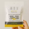 Lemon Honey CBD lozenges package: 200mg CBD, flavor, immune support, plant-based, lab-tested.