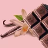 Premium chocolate bar with heart design, vanilla flowers, and pods on pink background.