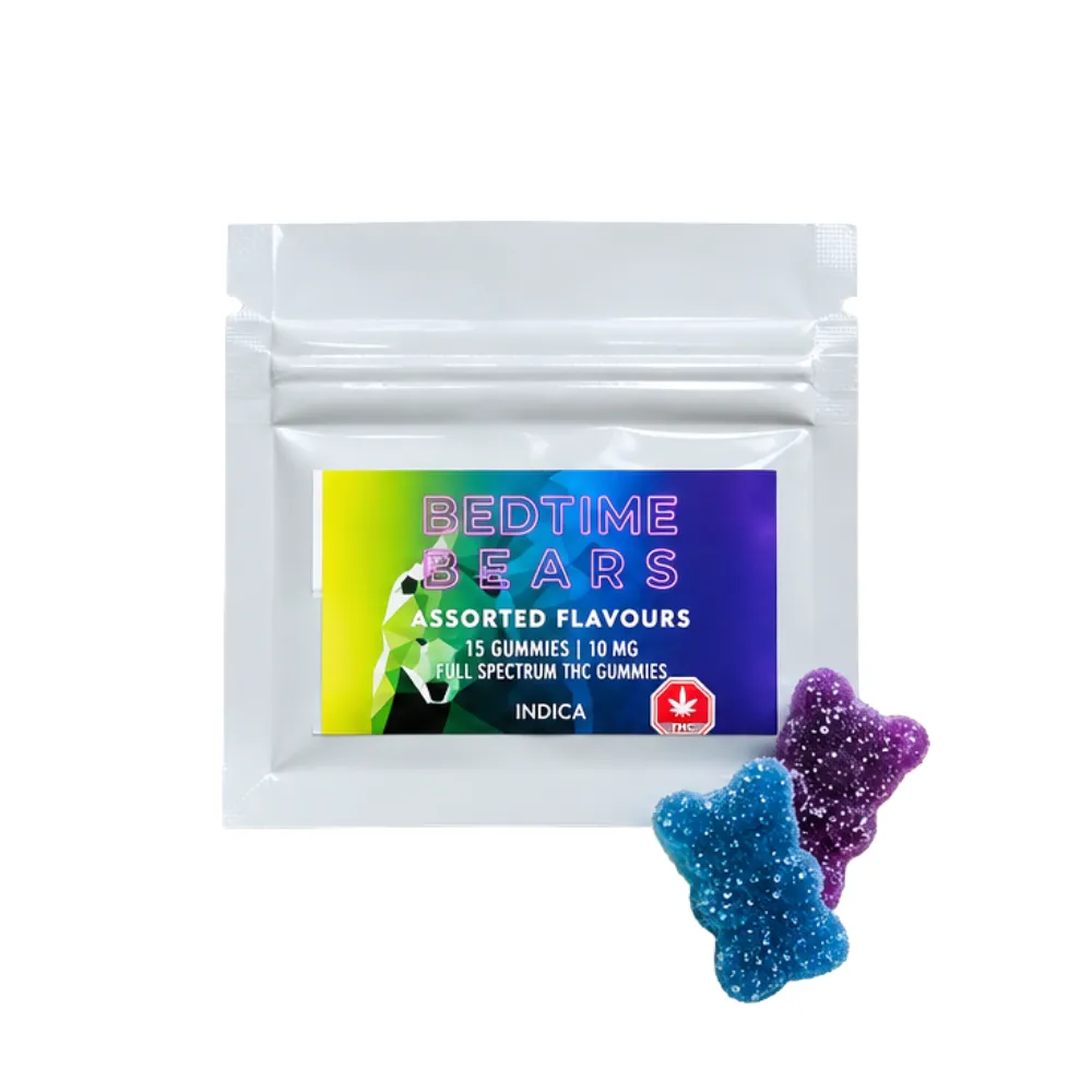 White pouch of Bedtime Bears THC gummies with two blue and purple gummies.