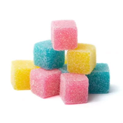 Assorted fruit-flavored sugar-coated jelly candies with vibrant colors and textured coating.