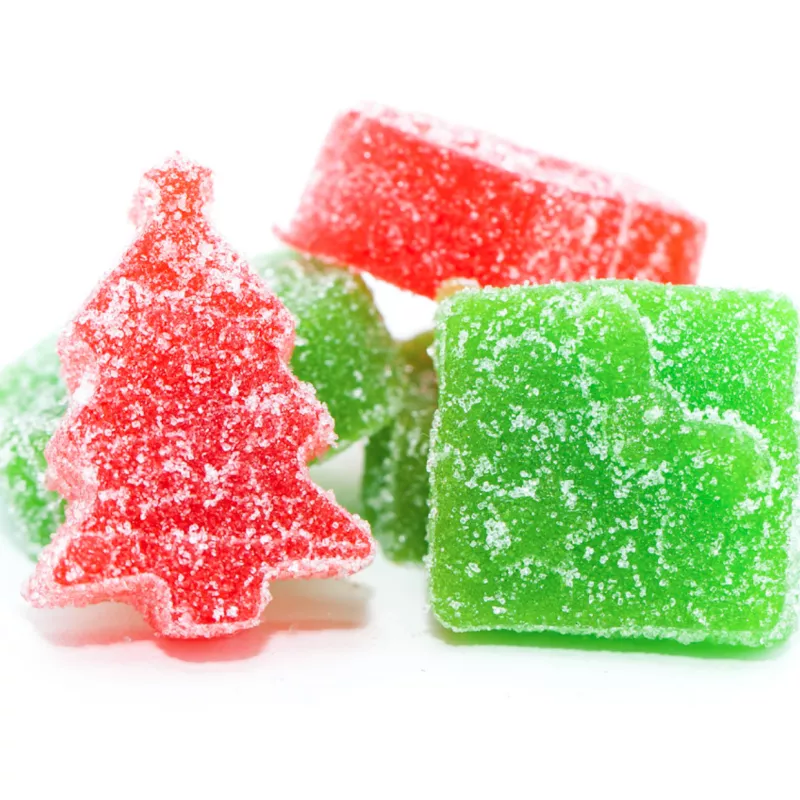 Colorful sugar-coated Christmas tree and cube gummies, festive holiday treats.