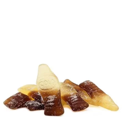 Sativa cola and citrus flavored MOTA gummy candies shaped like bottles on white background.