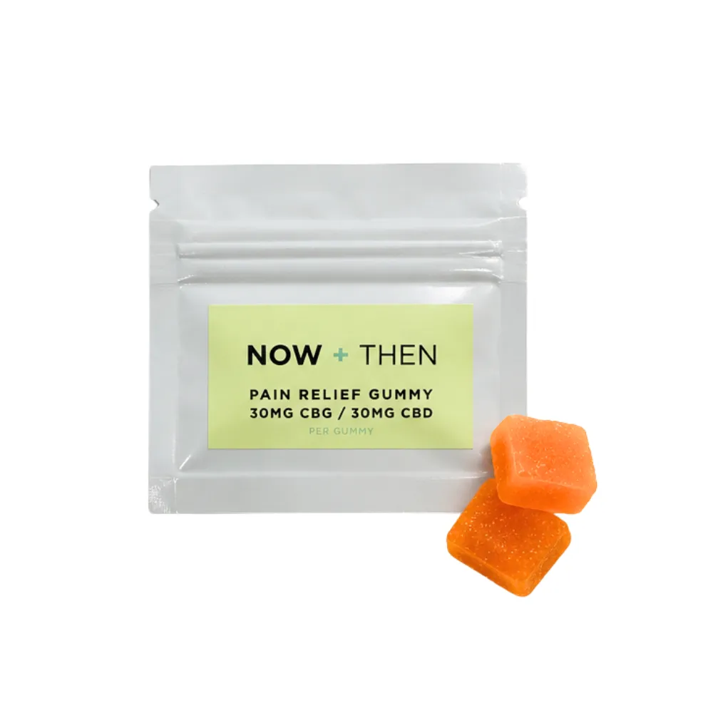 Now + Then pain relief gummy package with two orange gummies beside it.