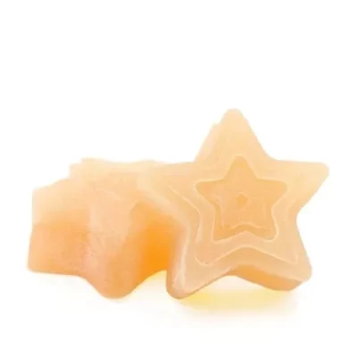 Orange star-shaped SeC StarLits THC gummies with glossy texture on white background.