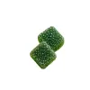 Two square green gummies coated in sugar crystals on a white background.