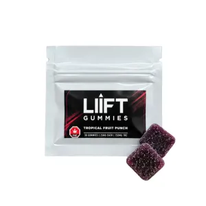 White pouch of Liift Tropical Fruit Punch gummies with two purple gummies beside it.