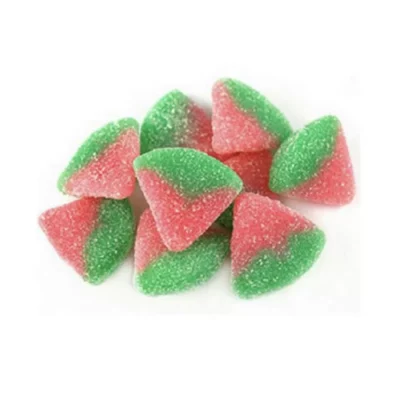 Colorful watermelon wedge gummies dusted with sugar for a sweet, chewy snack.