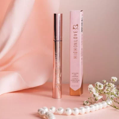 HighOnLove CBD Lip Gloss in Rose Gold Packaging with Pearls and Flowers.