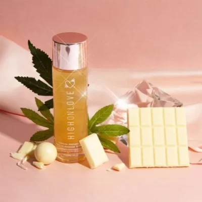 High On Love CBD Oil with White Chocolate on Pink Cushion