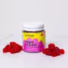 Vegan D3 B12 gummies with raspberry flavor by HerbaLand, surrounded by fresh raspberries.