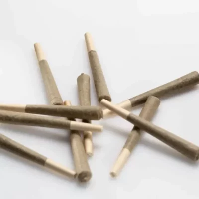 Set of tapered wooden dowels with pointed ends for crafting and tabletop games.