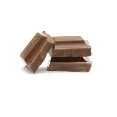 Three stacked COCO branded milk chocolate pieces with a glossy finish and premium texture.
