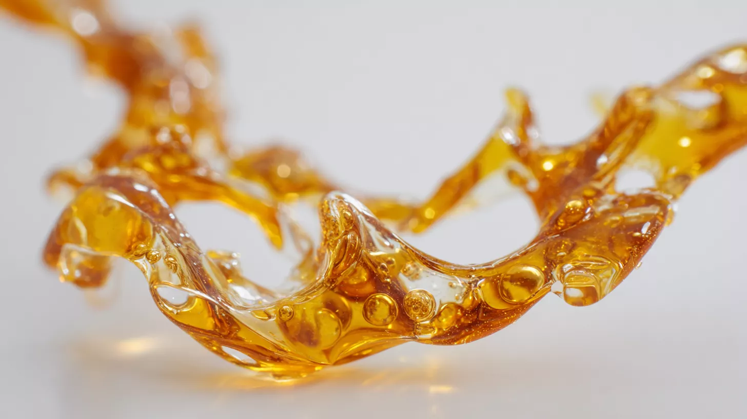 Golden liquid splash forming intricate shapes, showcasing fluid dynamics and light interaction.