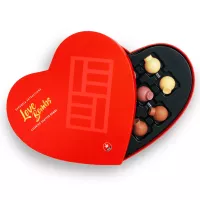 Shatter Love Bombs heart-shaped chocolate edibles with THC in elegant gift box