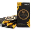 Opulence Shatter Bar THC chocolate packaging showcases luxurious design and cannabis content details.