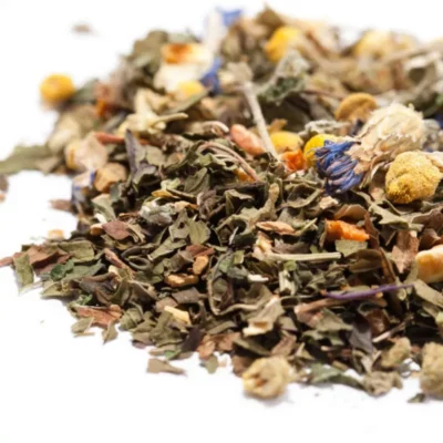 Close-up of a colorful, therapeutic herbal tea blend with diverse ingredients.