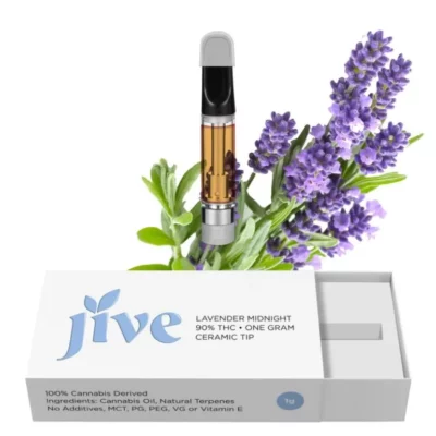 Jive 90% THC Lavender Midnight Vape Cartridge with Ceramic Tip and Fresh Lavender Surroundings.