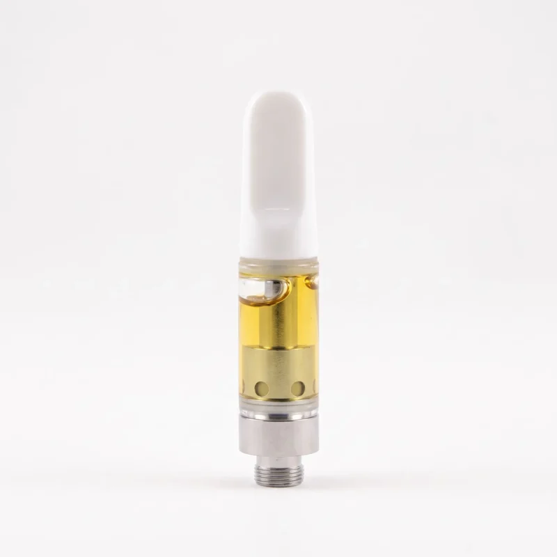 Kloud 9 Sativa Dominant THC Vape Cartridge Strawberry Cough 1g - product cartridge A clear vape cartridge filled with golden CBD oil, white mouthpiece, and metal base.