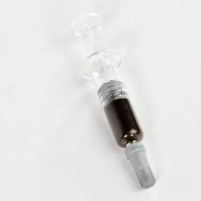 Indica THC Oil in single-use syringe with measurement markings on white background.