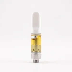 A clear vape cartridge filled with golden CBD oil, white mouthpiece, and metal base.