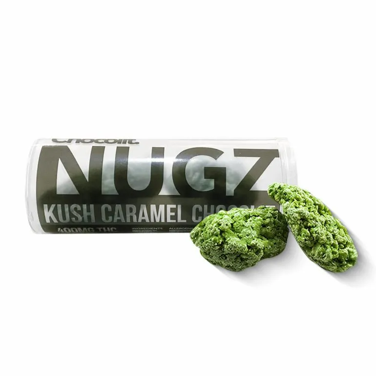 Boîte de Kush Caramel Chocolate Nugz avec des morceaux verts