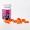 Bedtime Bears THC gummies bottle with orange bear-shaped gummies on white background.