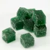 Green gummy candies coated in sugar, close-up view.