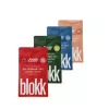 Four colorful candy packaging pouches in various flavors.