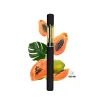 Black vape pen with gold cartridge, surrounded by fresh papaya and a tropical leaf.