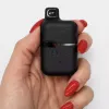 Hand holding a black Lift indica vape device