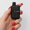 Hand holding a Lift Sativa vape device