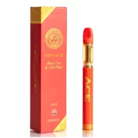 Versace-branded red and gold Indica THC vape pen with Greek key design packaging.