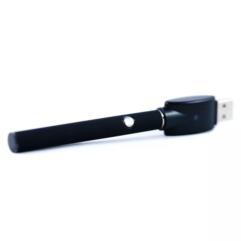 Voltaair black vape pen with USB charging and LED indicator on white background.