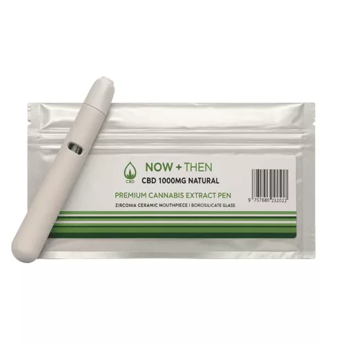 White cbd extract pen next to a silver packaging with green text.